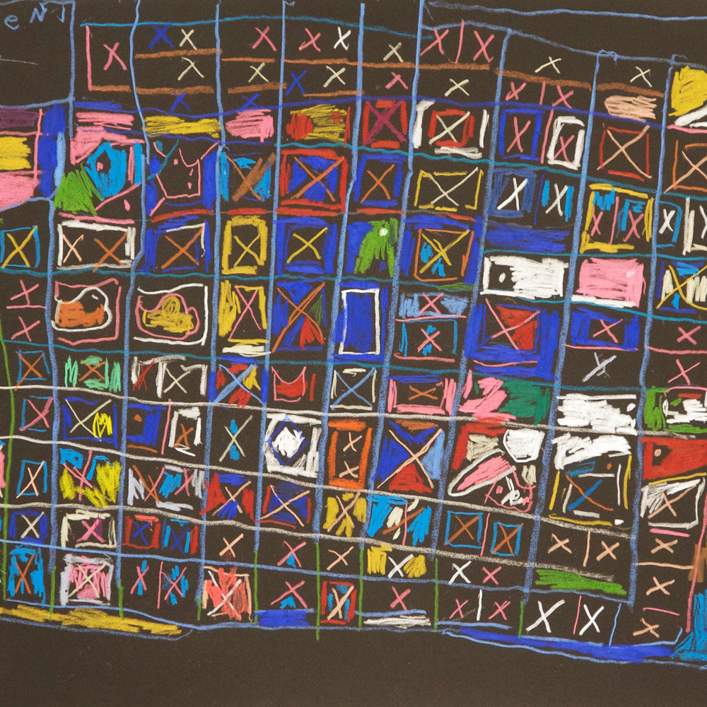 A drawing made with colored pencils on black toned paper. The drawing features a grid where each square contains an X or an oblong shape. Some squares are totally colored in with bright yellow, blue, or pink. The grid is outlined with light blue and green pencils, and the shapes are drawn in every color of the rainbow. The artist has written their name in a square on the top left corner of the grid, "Karen May"