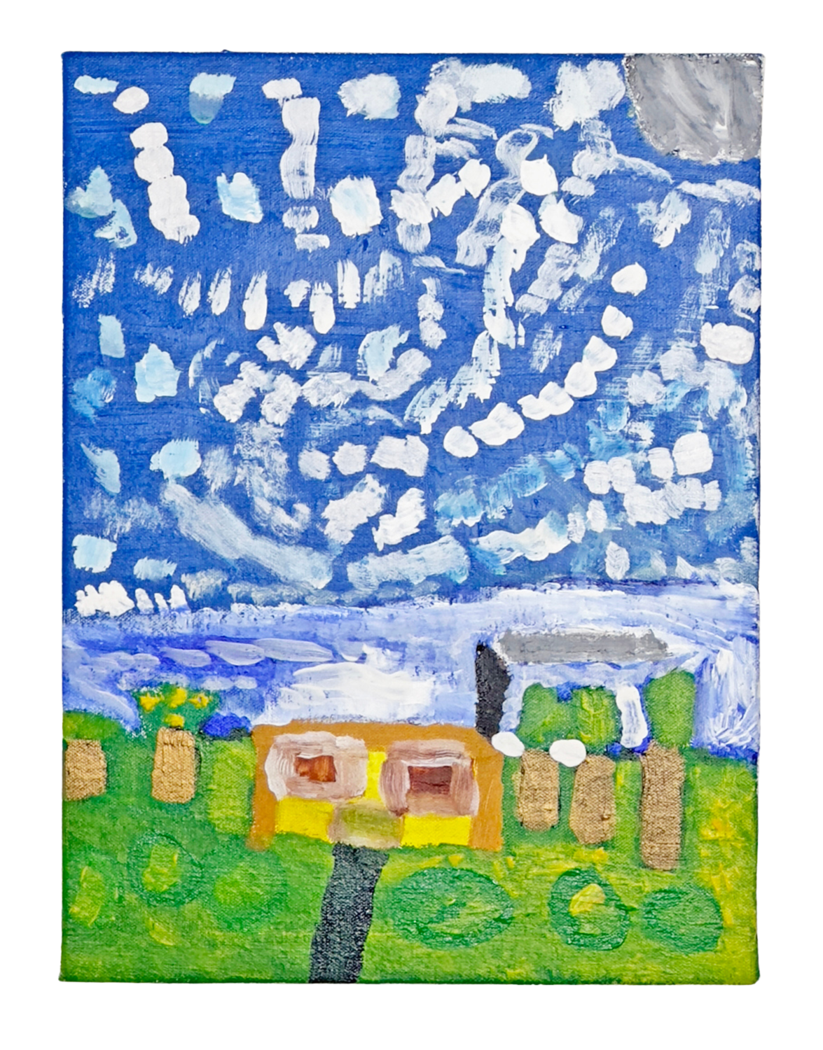 a rectangular painting with a dark blue sky and small white clouds covers most of the surface. A yellow and orange house surrounded by trees and grass sits at the bottom of the surface. 