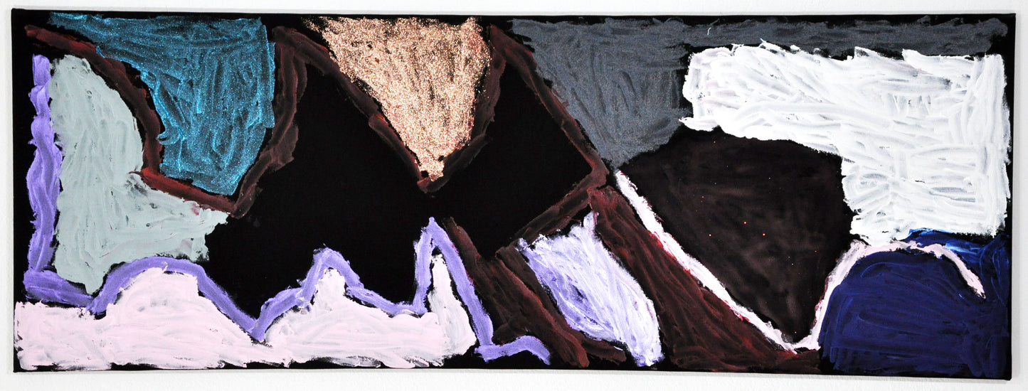 An abstract painting on a long rectangular canvas. The canvas is coated in black gesso. The surface is filled with jagged shapes painted white, pale green, pale pink, shimmering blue, silver, and gold. A thin lavender line snakes in from the left side, outlining an angular mountain range form. Above this form, another zigzagging line painted in dark reddish brown divides black space from blue and gold triangles.